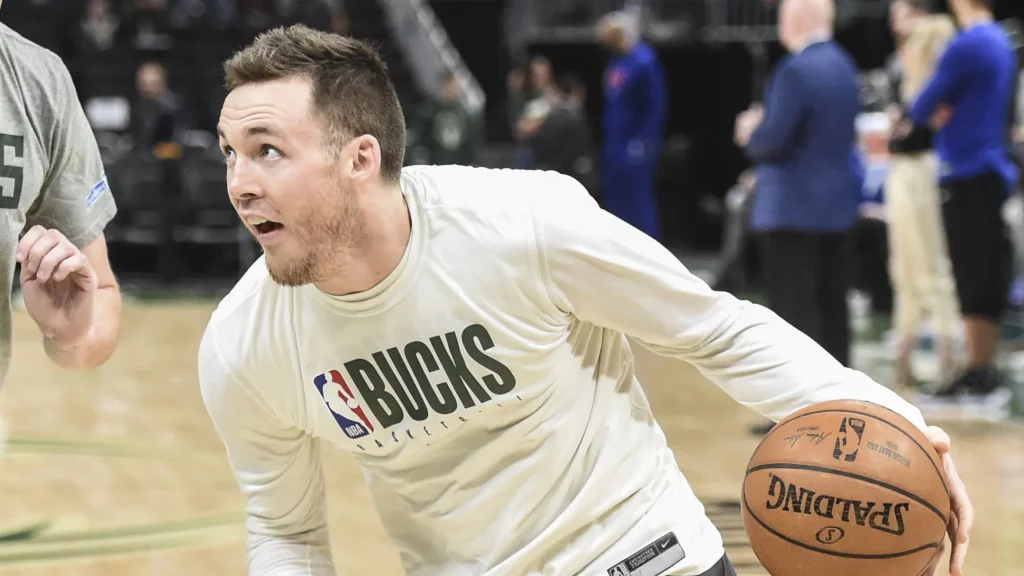 Milwaukee Bucks guard Pat Connaughton humorously warned spectators to…