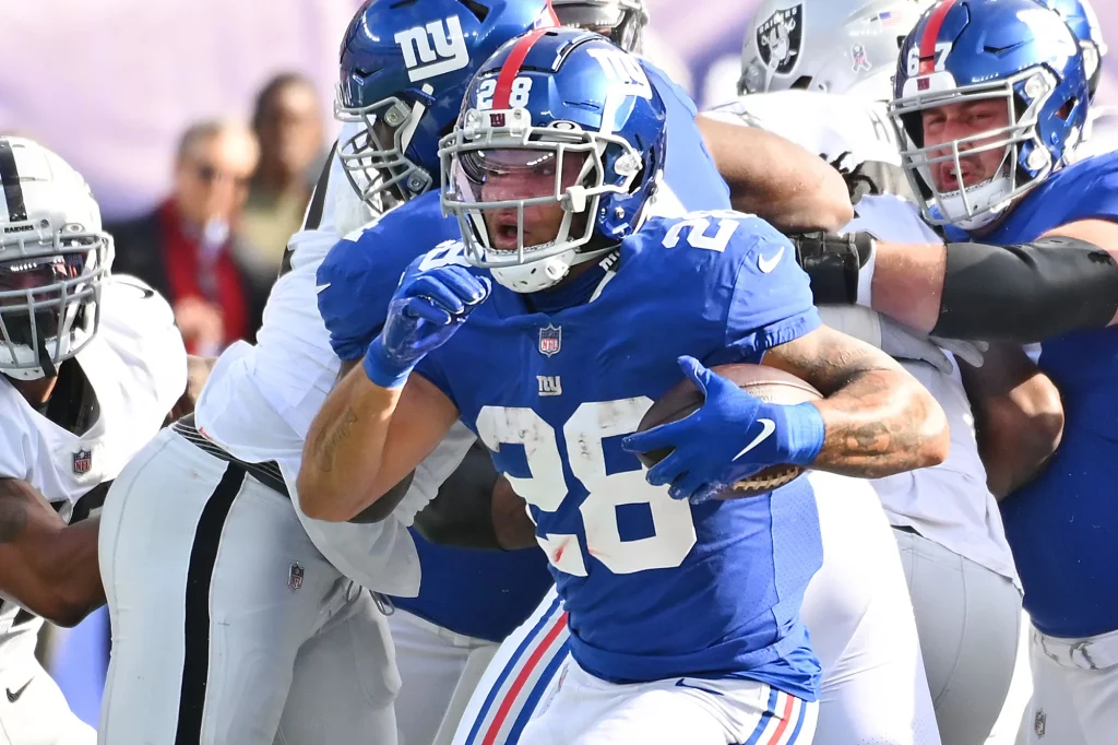 Surprise Return: Devontae Booker in Talks with New York Giants for a Comeback