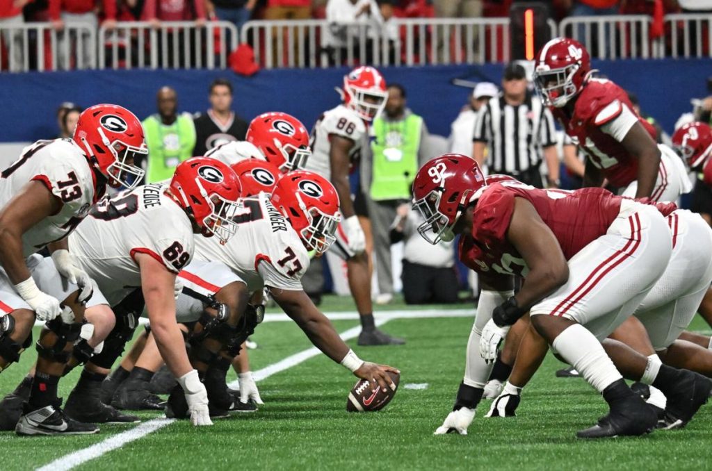 Alabama football players respond to Donald Trump’s presence during their upset victory against Georgia.