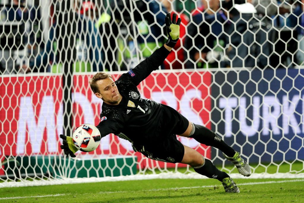 Germany-goalkeeper-Manuel-Neuer-stops-the-ball-during-a-soccer-game