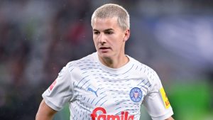 Was für ein Deal: Holstein Kiels erfahrener Verteidiger John Tolkin bittet nach entscheidendem Treffen um Wechsel zum 1. FC Köln